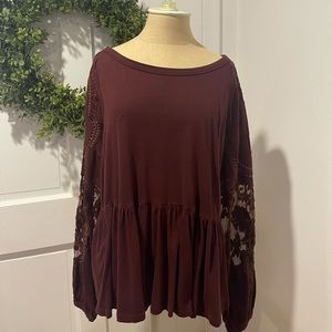 Free people blouse in red with fun lace sleeves, women’s blouse size large